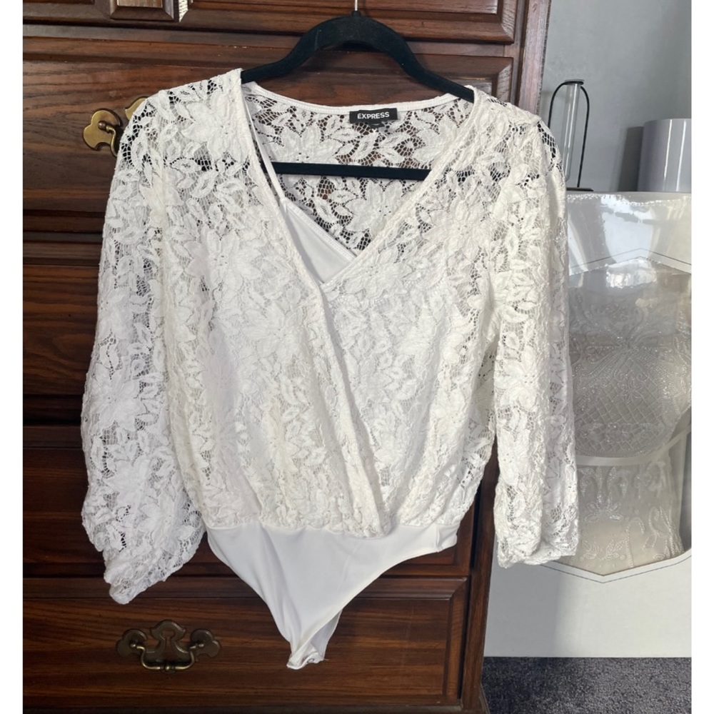 White lace body suit.